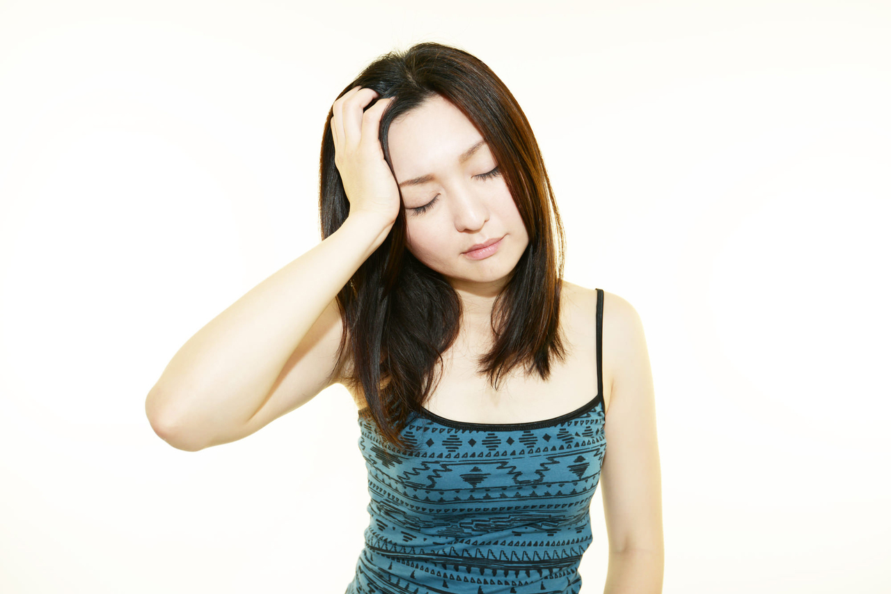 頭痛の女性